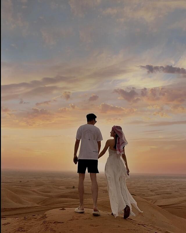 Couple exploring desert landscape